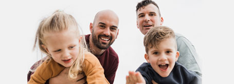 Couple playing with their children